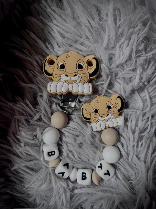 Attache tétine lion