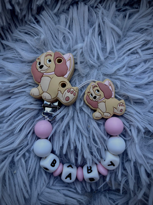 Attache tétine chienne Rose
